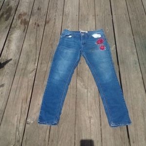 Skinny jeans with rose design